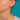 Garnet drop earring worn for scale