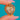 Heart-shaped reverse window containing blonde hair and decorative wire