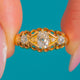 18ct Gold Antique Old Mine-Cut Diamond Trilogy Ring, front view of the three main Diamonds and openwork Gold surround